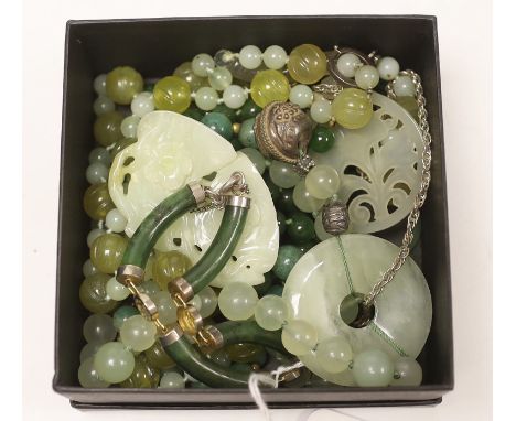 A group of assorted jade jewellery including bracelet, necklaces etc.