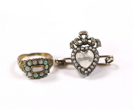 A Victorian yellow metal and white opal cluster set ring, size O and a similar moonstone and split pearl cluster set bar broo