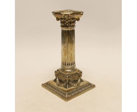 An Edwardian silver Corinthian column candlestick, by Martin, Hall &amp; Co, Sheffield, 1903, 17.3cm, weighted.