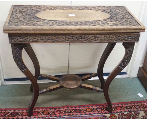 A Victorian oak fold over card carved with Celtic knot design, 74cm high x 81cm wide x 38cm deep Condition Report: Available 
