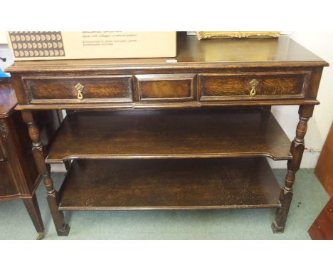 An oak buffet with two drawers, 93cm high x 122cm wide Condition Report: Available upon request