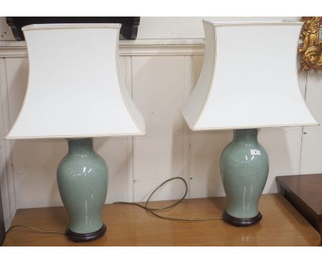 A pair of modern green ceramic table lamps (2) Condition Report: Available upon request