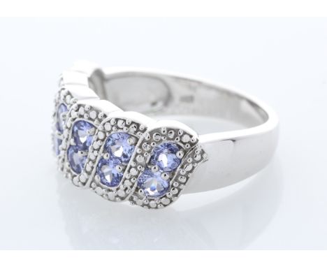 Sterling silver tanzanite ring, set with twelve round tanzanite. Item Specifications: Metal: Silver.  Ring Size N (NB. Ring s