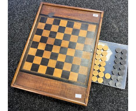 Antique folding chess/ checkers board Includes wooden checkers. 