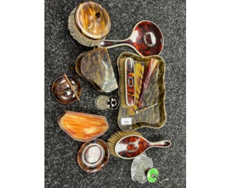 A Selection of antique/ vintage faux tortoise and tortoise shell and silver dressing table items. Includes Hand mirror, Brush