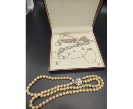Three silver necklaces, silver Anchor pendant, Swarovski crystal chain with heart pendant, loose earrings and pearl necklace.