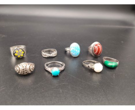 A Lot of eight various silver 925 rings set with various stones, Includes Opal, Malachite, Red Agate and art glass. 