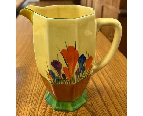 A Vintage Bizarre Clarice Cliff 'Crocus' hand painted water jug. [18cm high] 