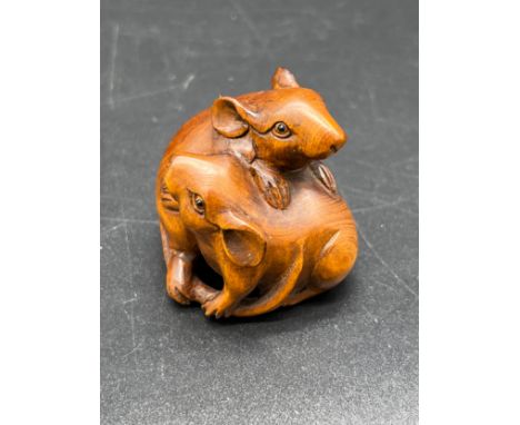 Japanese hand carved box wood netsuke sculpture of two mice cuddled together. Both fitted with black bead eyes and signed. [3