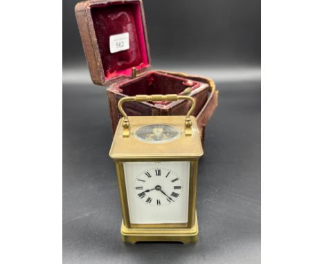 Antique Brass and bevel glass carriage clock, French double drum movement and chime. In a working condition with a good chime