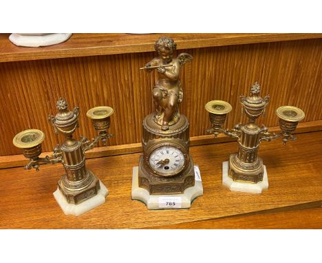 19th century three piece clock set, Gilt brass ormalu style clock body, Cherub figure seated to the top of the clock, white e