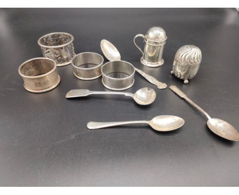 A Collection of silver marked items to include four napkin rings, Two silver pepper pots, Victorian London silver mustard lad