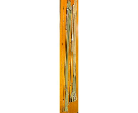Two vintage two piece split cane fishing rods with bags. Hardy's 'The No2 L.R.H. 9'6" 'Palakona' spinning'- Has spanner and s