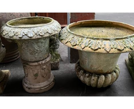 A Large garden urn top, one small garden urn top and cylinder ornate base. 