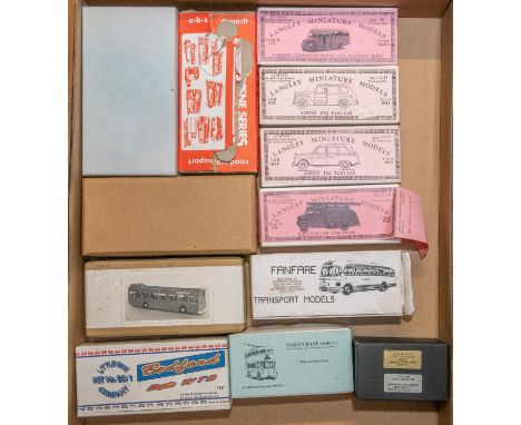 12 white metal model kits. mainly buses, also includes 2 x Langley Miniatures taxi kits and a Langley Miniatures fire engine.