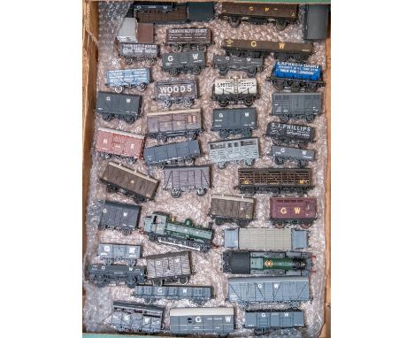 2 OO locomotives and a quantity of OO kit built rolling stock. A Bachmann GWR 0-6-0 pannier tank, RN 9643 and an unmarked GWR