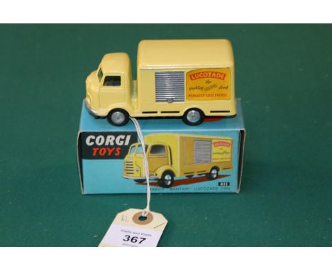 Corgi Toys Karrier "Bantam" Lucozade Van (411). In yellow livery with silver plastic roller shutter door to nearside, LUCOZAD