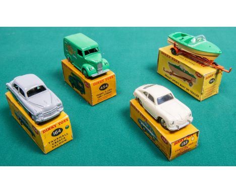 4 Dinky Toys. Vauxhall Cresta Saloon (164) in light grey and dark green with grey wheels. Trojan Van (454), in green CYDRAX l