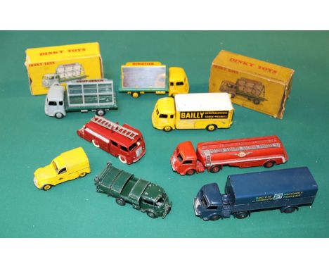 8 French Dinky Toys. 2x Simca Cargo 'Miroitier', both versions, yellow/green and dark green/grey, both complete. In remains o