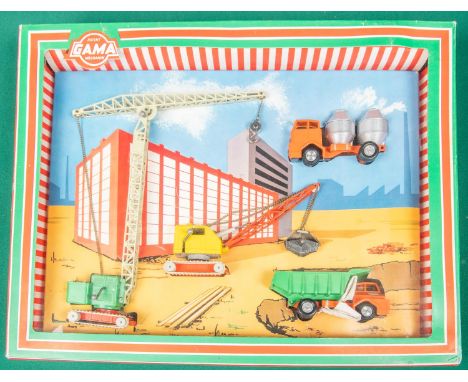 An impressive early 1970's GAMA Mechanik construction Gift Set. Comprising a tracked tower crane with chain and hook, a track