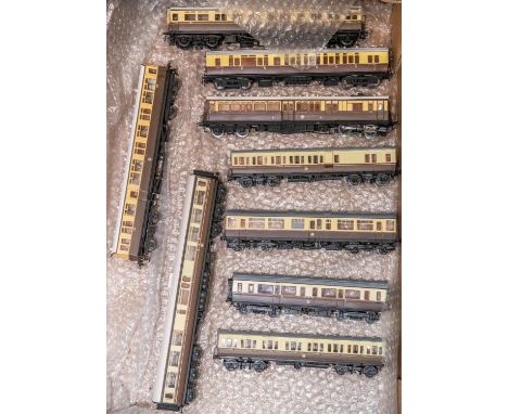 An unusual OO gauge brass 2 rail electric GWR Steam Rail Motor, RN75. In chocolate and cream livery, with white roof, well de