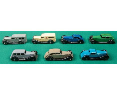 7 early post WW2 Dinky Toys. Bentley Coupe in light blue, Daimler in dark green, Rolls Royce in fawn, Rover Coupe in dark blu