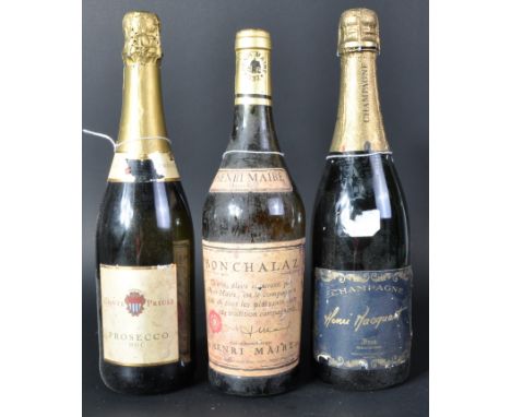 Three bottles of alcohol comprising a Conte Priuli Prosecco Doc, Henri Macquart Champagne and a bottle of Henri Maire Depuis 