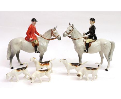 Beswick Hunting Group Comprising: Huntsman, model No. 1501 and Huntswoman, model No. 1730, both Style Two: Standing, grey glo