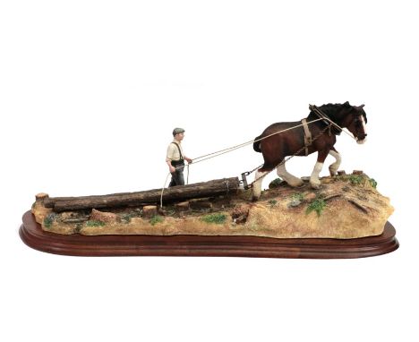 Border Fine Arts 'Logging', model No. B0700, by Ray Ayres, limited edition 863/1750, on wood base, with box and certificate. 