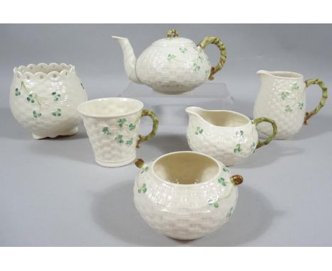 Various Belleek porcelain, to include teapot, decorated with clover, 11cm high, similar milk jug, miniature jardiniere, other