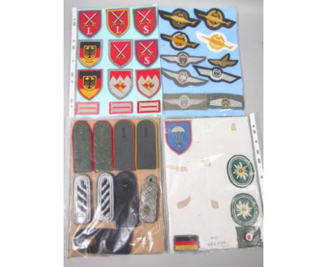Military and army related embroidered shoulder badges, to include West German, Parachute badge, shoulder badges, various Germ