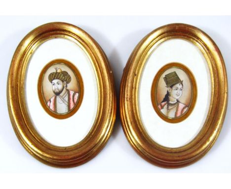 Indian School.  Portrait miniatures, lady and gentleman dressed in finery, a pair, 7cm x 5cm. (2)