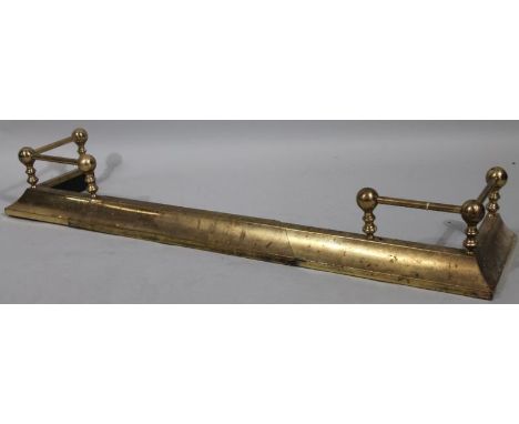An early 20thC brass D-end fender, 133cm wide.