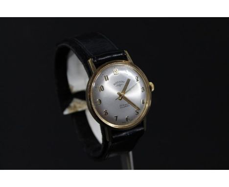 A lady's Buren cocktail watch, with 2cm dia. dial, with baton pointers and material strap and a gentleman's Rotary wristwatch