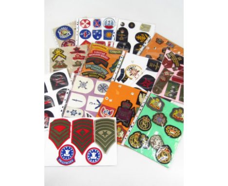 Various iron on war related Army Naval cloth badges, shoulder badges, etc, to include Queens York Rangers, 11cm wide, Royal E