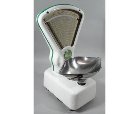 A mid-20thC Avery shop scale, in white and green metal with (removable) chrome plated pan, 53cm high.