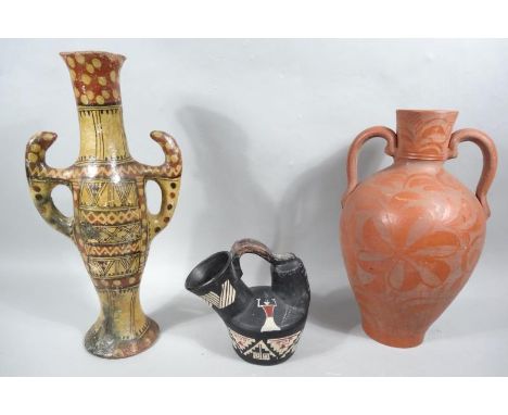 Various tribal pottery and other items, comprising a redware vase, decorated with flowers, 39cm high, vessel and two handle s