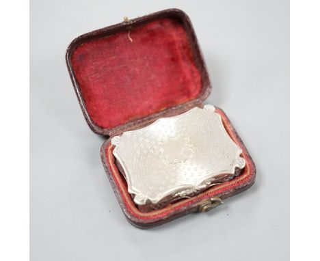 An early Victorian engine turned silver shaped rectangular vinaigrette, by Nathaniel Mills, Birmingham, 1843, 36mm, in leathe