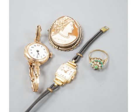 A lady's early 20th century 9ct gold manual wind wrist watch, on a 9ct strap, gross 16.4 grams, a lady's 18k watch, gross 9.9