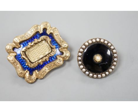 A Victorian yellow metal overlaid and blue enamel set mourning brooch, 31mm and one other seed pearl set mourning brooch.