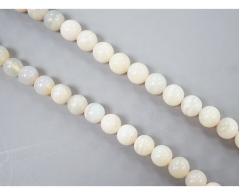 A modern single strand white opal bead necklace, with 585 yellow metal clasp, 44cm.