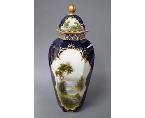 A Royal Worcester landscape painted hexagonal vase and cover signed ‘R.Rushlow’? 24cm