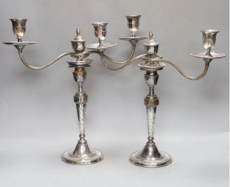 A pair of Sheffield plate two branch two light candelabrum,37 cms high.