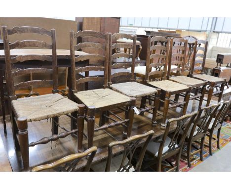 A set of six oak rush seat ladder back chairs