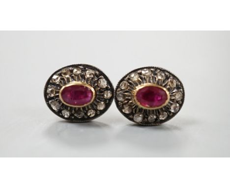 A pair of yellow metal, ruby and rose cut diamond set oval cluster earrings, 10mm, gross 3.2 grams.