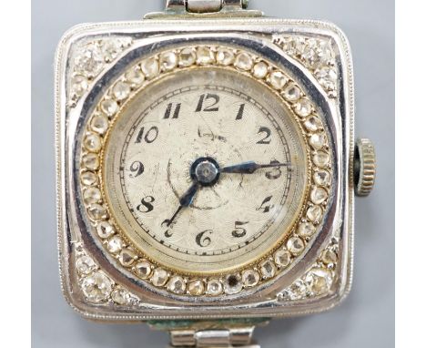 A lady's early 20th century white metal (stamped Plat) and diamond chip set manual wind cocktail watch, on a later 9ct white 