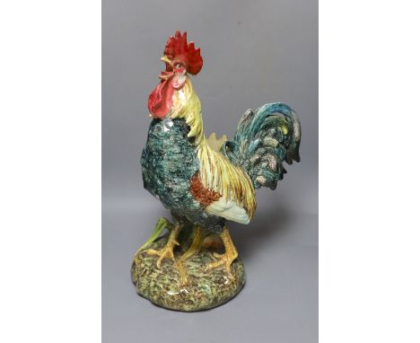 A large Continental majolica ‘cockerel’ planter/vase,55cms high.