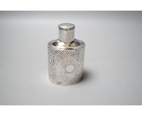 A late Victorian hammered silver oval tea caddy, Henry Matthews, Birmingham, 1895, 11.5cm, 108 grams.