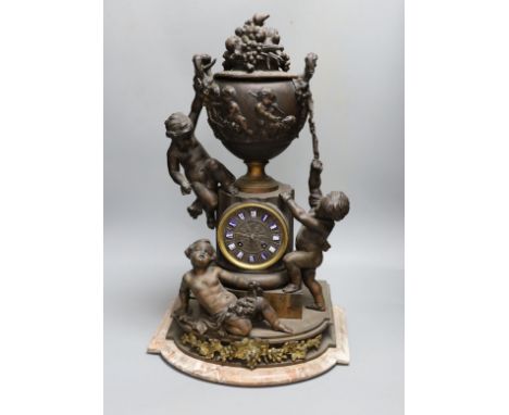 An early 20th century French bronzed spelter cherubic mantel  clock 52cm