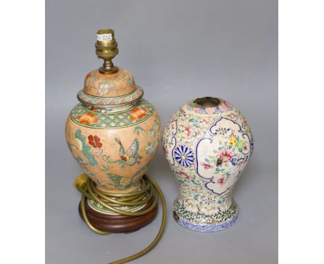 An 18th century Chinese Canton (Guangzhou) enamel vessel and a porcelain table lamp (2)